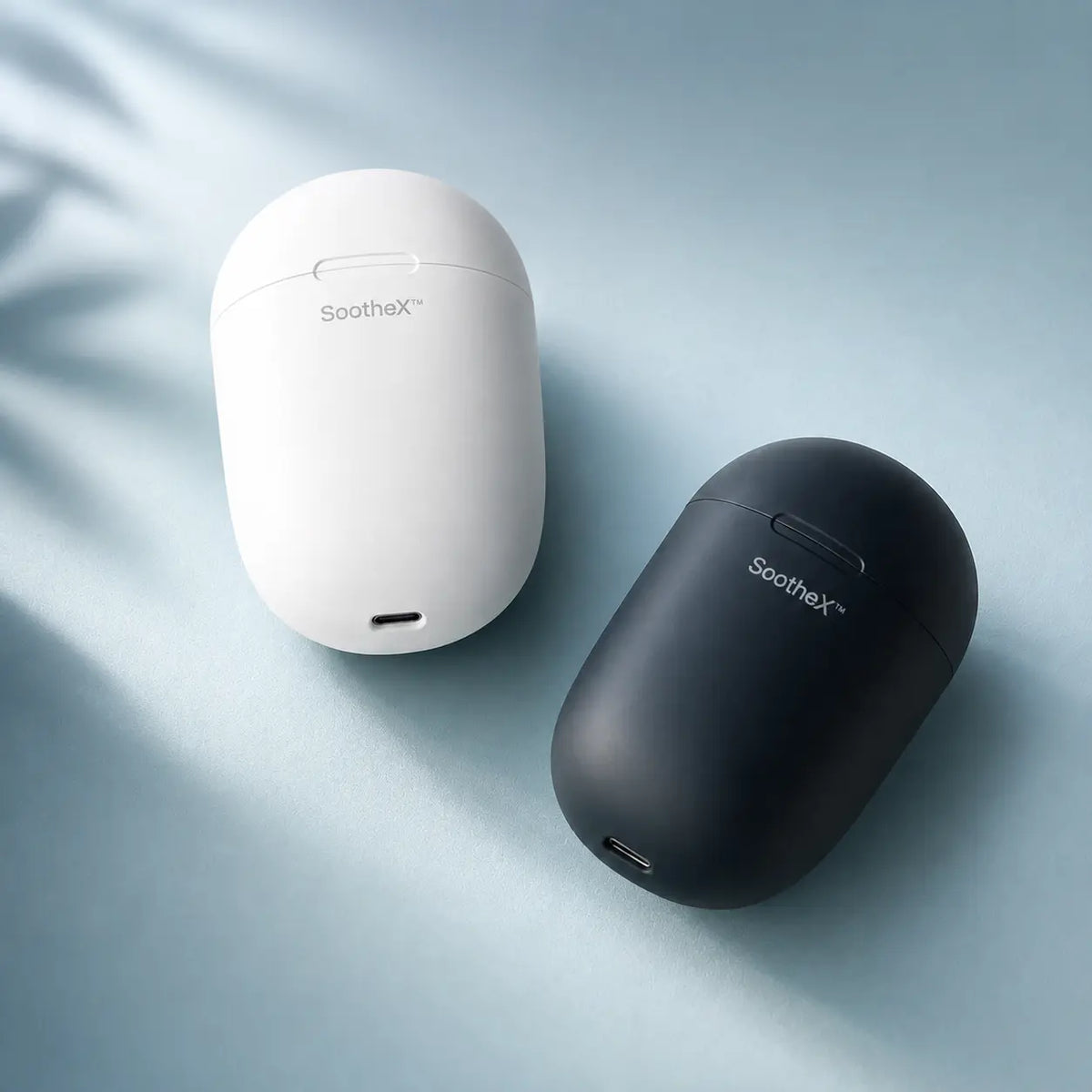 SootheX pods white and black
